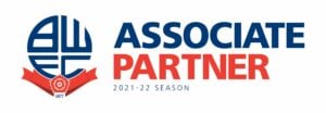 Bolton Wanderers logo in blue and red with writing next to it stating "associate partner 2021-2022 season"