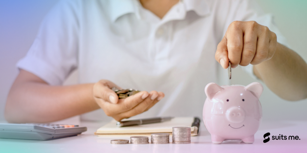 Man saving money using a piggy bank