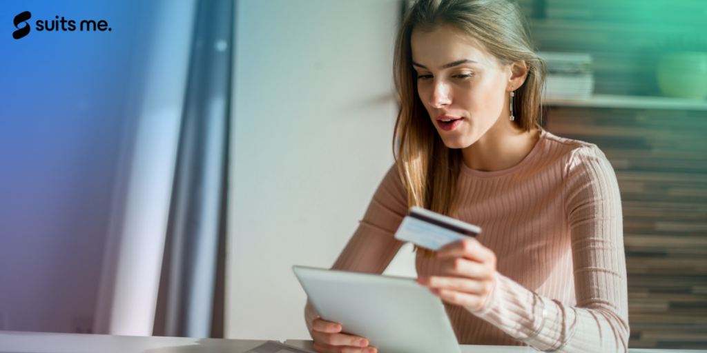 woman on her tablet checking her credit score as her company will be checking too