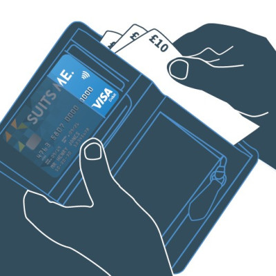 Image of debit card and cash in wallet