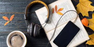 Audio books, reading and coffee with Autumn leaves