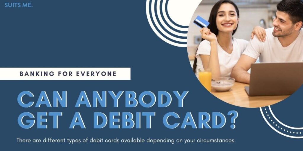 Woman and man sat in front of a laptop with the woman smiling and holding a debit card. Banking for Everyone concept.