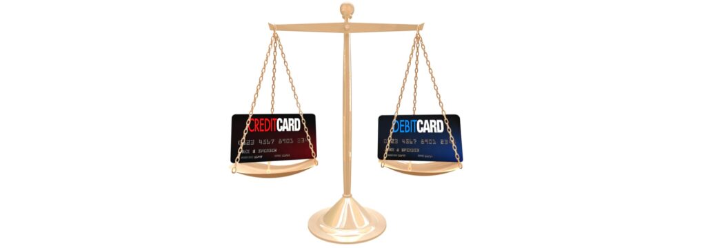 Credit Card Vs Debit Card Balancing on Kitchen Scales