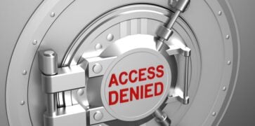 Access Denied in bold text on a locked banking vault