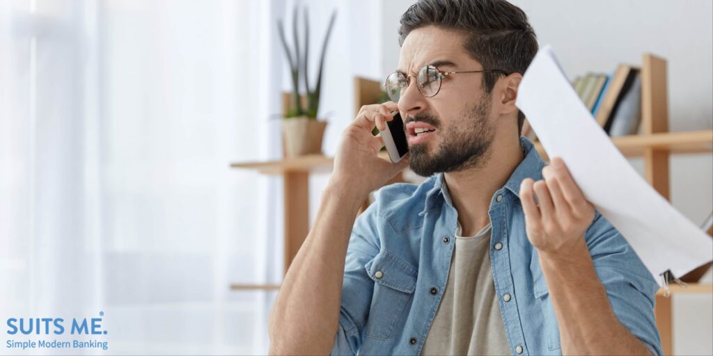Angry and Upset young man and migrant worker who can't gain access to a banking account