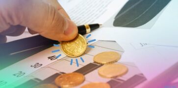Man assessing his cash on top of financial papers