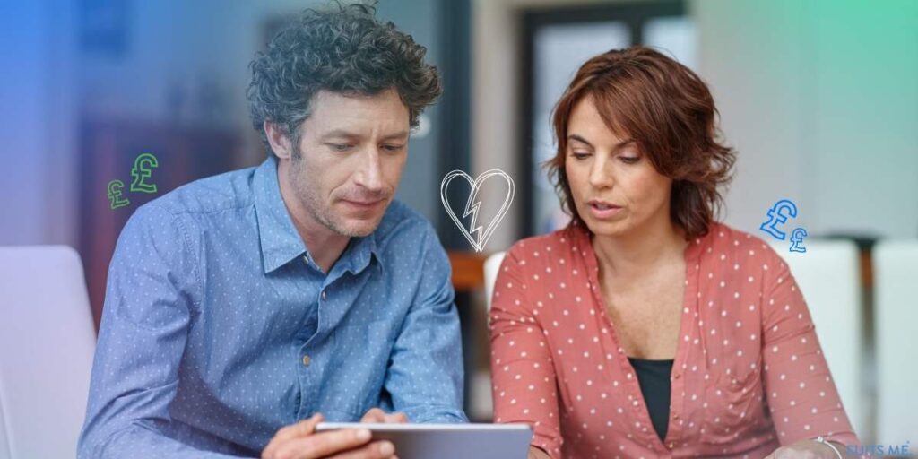 Couple sitting down to organise their finances after separating