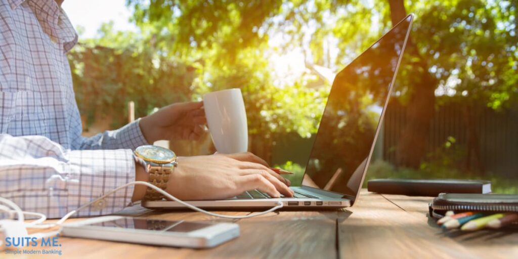 Business Man working outdoors using the internet to check emails