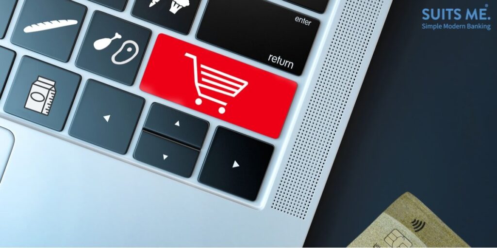 Online Shopping Concept for Fresh Produce During the Coronavirus Outbreak, Keyboard letters replaced with products and cart. Debit Card next to Keyboard to make Online Payment