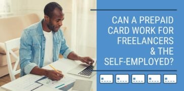 Self-employed man sat at a desk working on his business, with blue textbox, white bold text, small cartoon images of prepaid cards