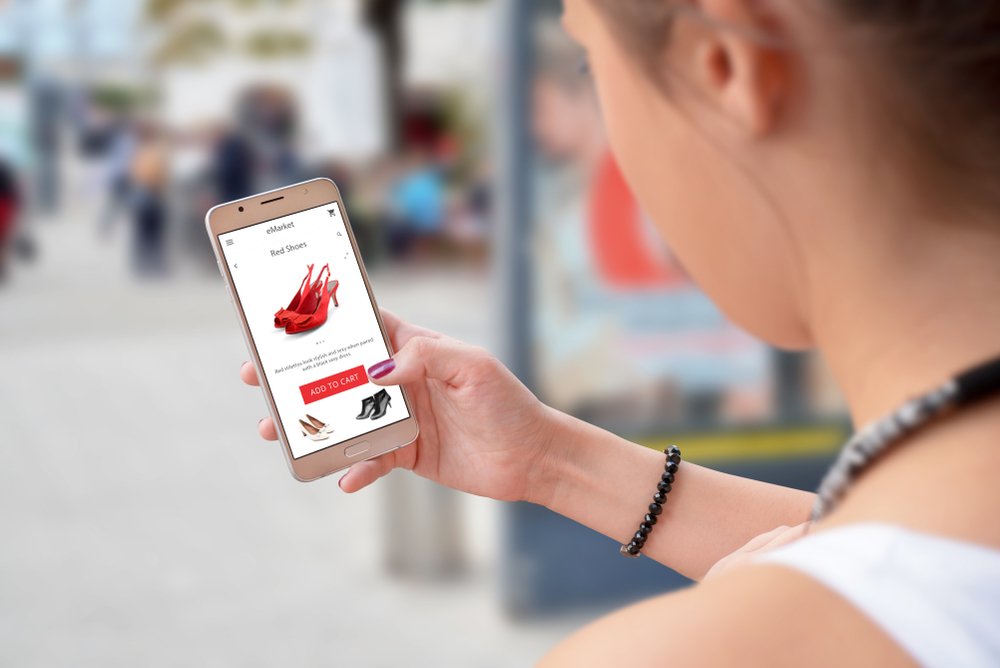 Young lady using shopping app