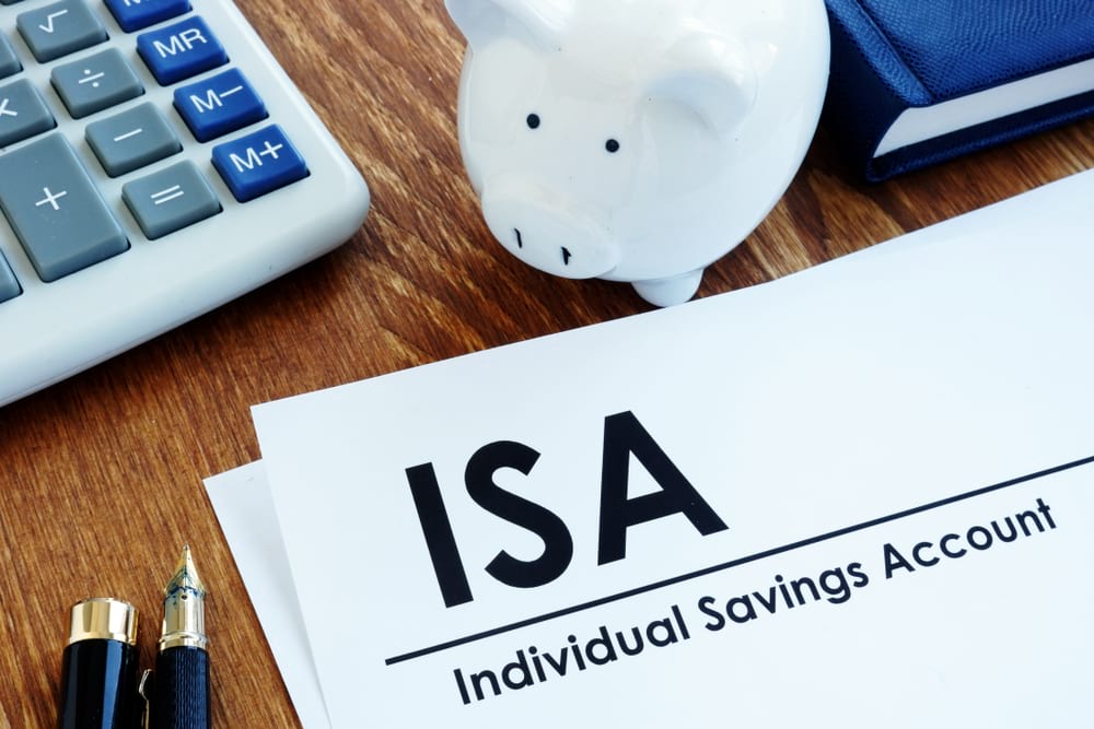 ISA document with a piggy bank next to it