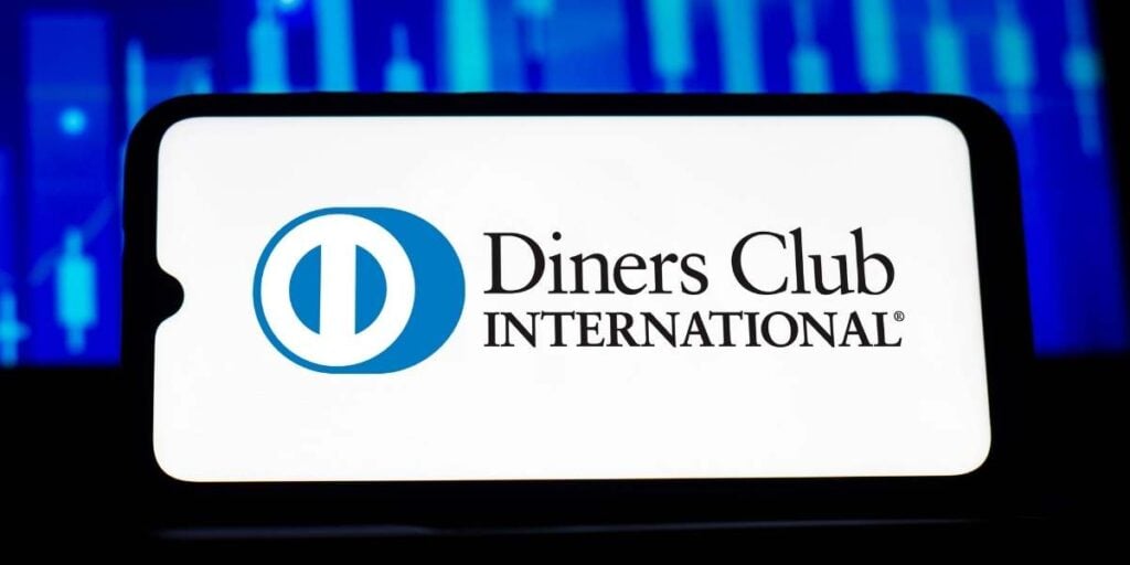 In this photo illustration the Diners Club International logo seen displayed on a smartphone screen