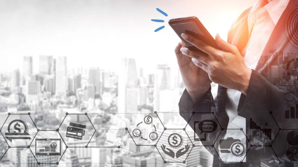 Businessman Using His Smartphone to Manage His Mobile Banking Account. A Popular Aspect of Alternative Banking