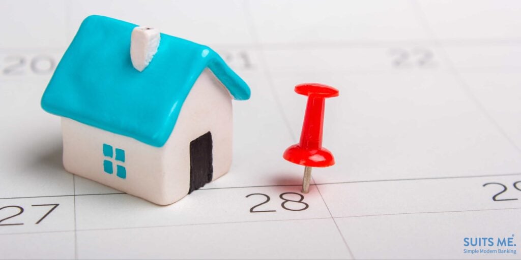 Calendar with house and pin representing the date rent payment is due via a standing order