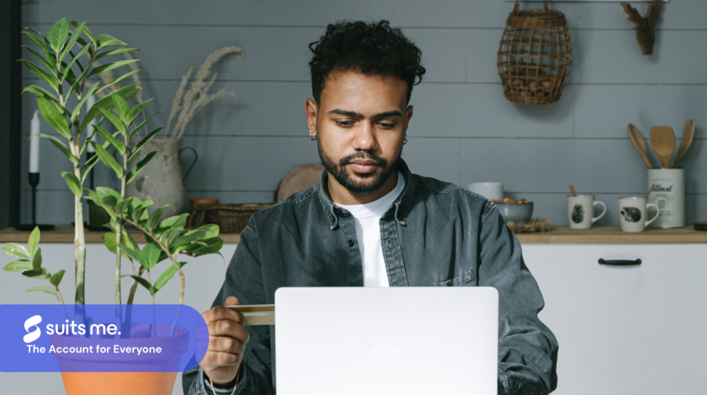 person using a laptop with prepaid card