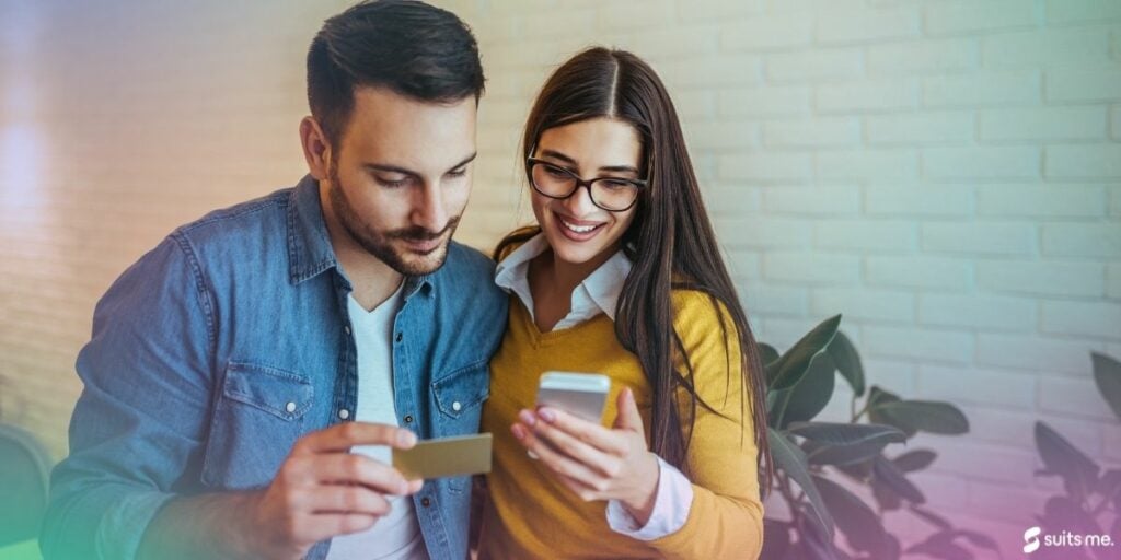 Couple happy because they've been able to build their credit score quickly to open a new account