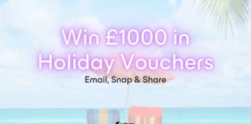 White sandy beach with neon pink text announcing the launch of a competition