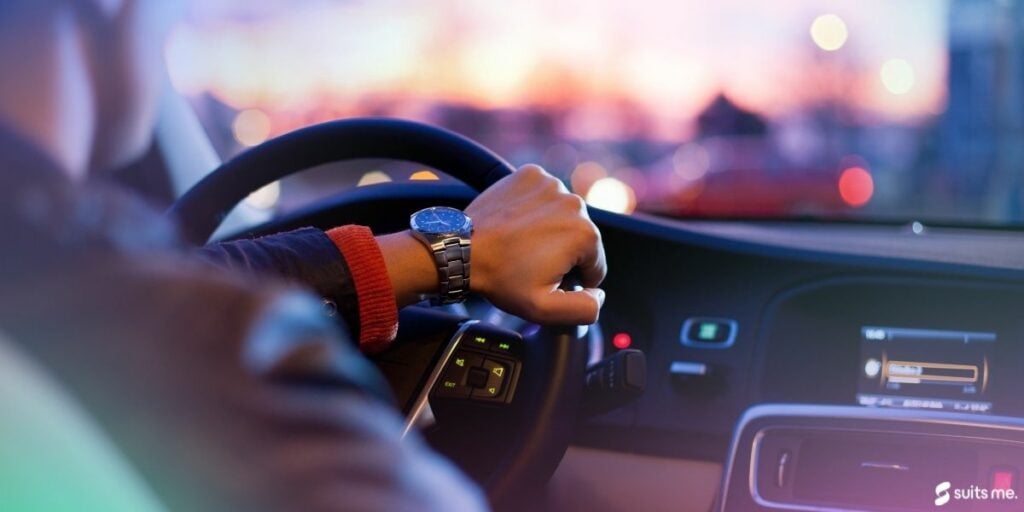 Business man using his car as transport to get to work