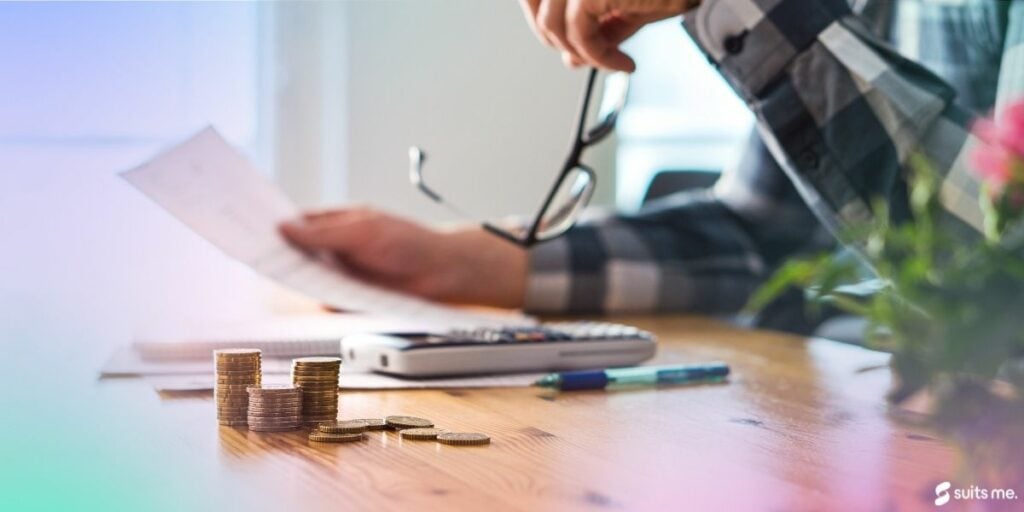 Man looking through his personal finances to repair his credit record after being declared bankrupt.