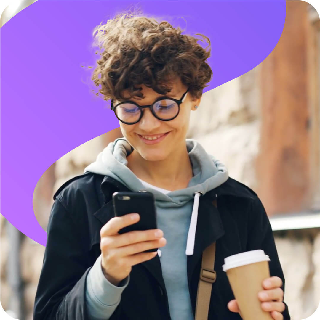 happy woman looking at phone with second chance account